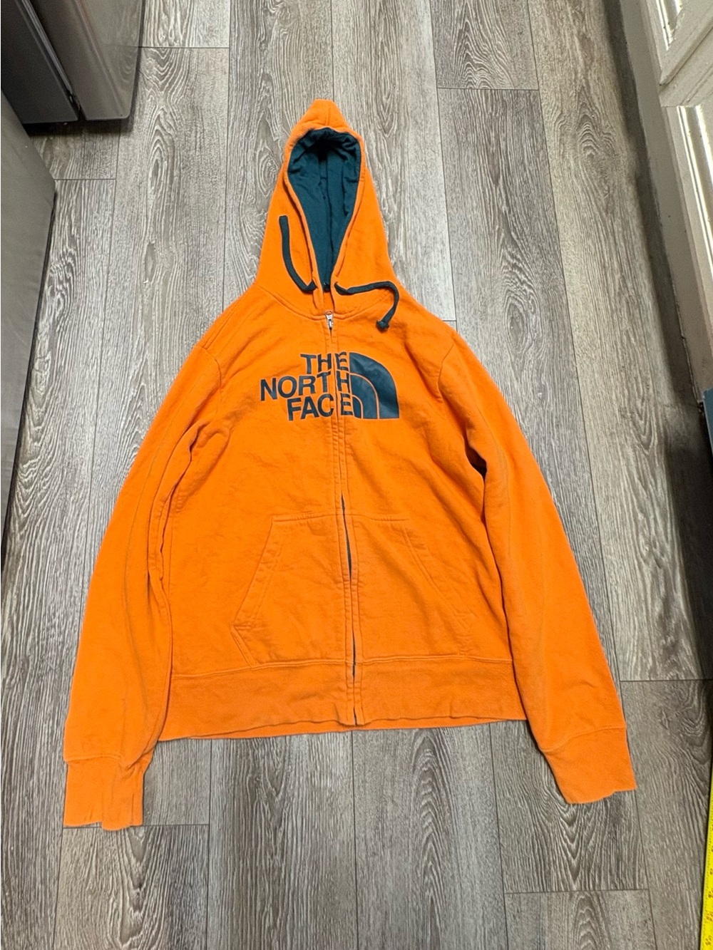 The North Face Orange Hoodie with Dark Teal Logo